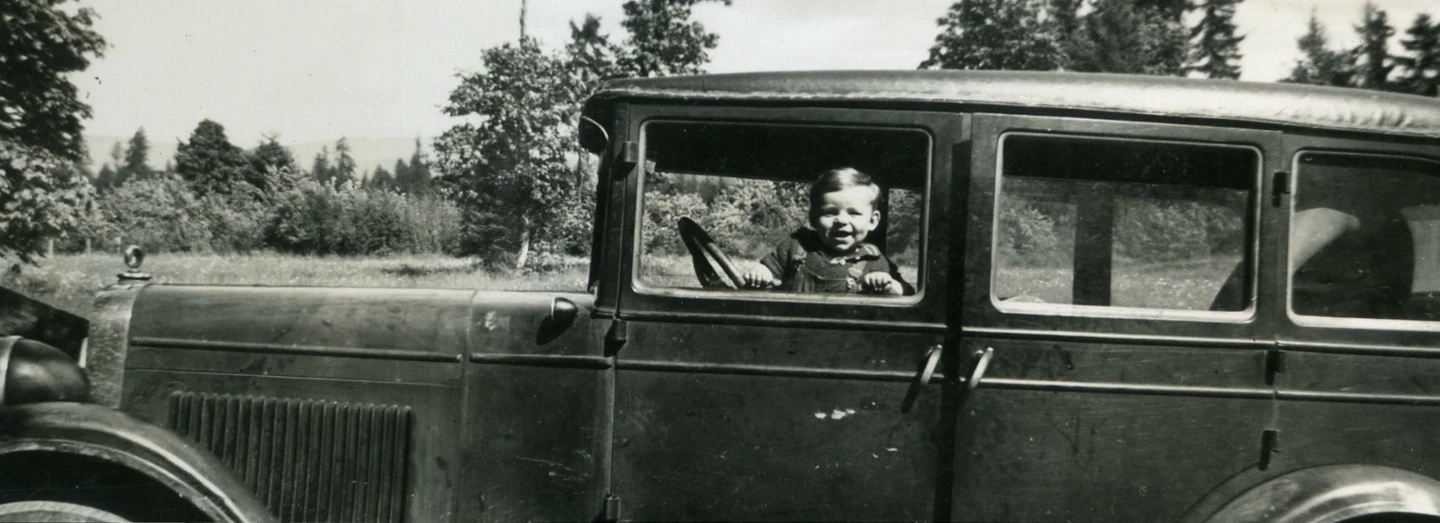 Young man and a 1920's Chrysler